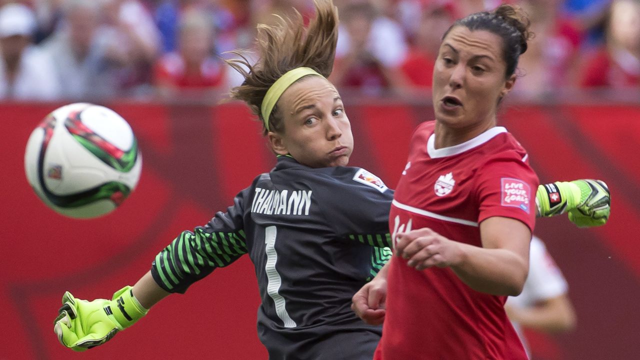 Canada's Melissa Tancredi tries to get a shot past Swiss goalkeeper Gaelle Thalmann.