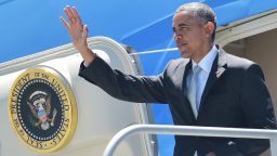US President Barack Obama steps of Air Force One upon arrival at San Francisco International Airport on June 19, 2015. Obama is in San Francisco to address the US Conference of Mayors and to attend fundraisers.