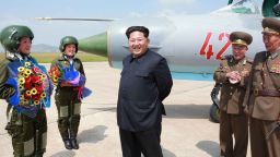 Kim Jong-Un meets with North Korea's first female fighter jet pilots in this undated picture released by North Korea's state media on Monday, June 22. He called the women "heroes of Korea" and "flowers of the sky."