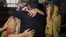 Relatives mourn the death of a heatwave victim at the EDHI morgue in Karachi on June 21, 2015. A heatwave has killed at least 45 people in Pakistan's largest city of Karachi, officials said June 21, as residents grapple with frequent power outages and water scarcity during the Muslim fasting month of Ramadan.