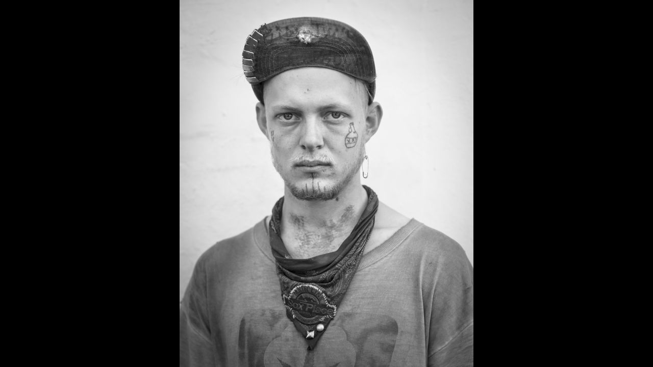 "I met and photographed this traveler in New Orleans," Joseph said. "Travelers often have face tattoos. Some are common, such as the symbol for 'squatter's rights,' while others are personal. The jug with the XXX is a moonshine jug, and the triple X means that the shine has been run through the still three times so it's almost pure alcohol."