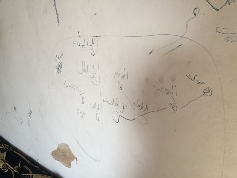A rough map of the area near Tal Abyad is scrawled onto a wall in a former ISIS building. <br /><br /><br />