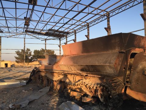 The remains of an ISIS armored vehicle, lies useless after being bombed by the coalition airstrikes.