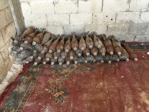 82 mm mortar rounds found in the back of a mosque in Tal Abyad. ISIS used the Osama bin Laden mosque in the border town for munitions storage. The YPG is clearing the weapons out of the building.