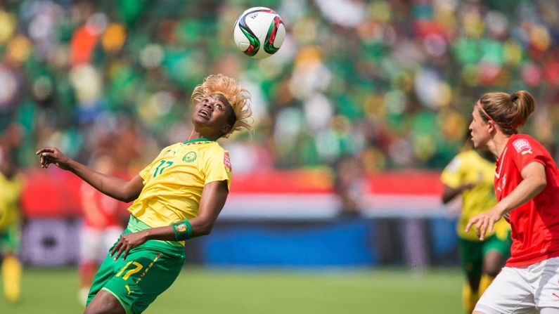 Cameroon's Gaelle Enganamouit heads the ball during the first half of their FIFA Women's World Cup group C match against Switzerland at Commonwealth Stadium in Edmonton, Canada, on Tuesday, June 16. Cameroon won the game 2-1, but lost on Sunday to China, forfeiting its place in the quarter finals. <a href="index.php?page=&url=http%3A%2F%2Fwww.cnn.com%2F2015%2F06%2F06%2Fsport%2Fgallery%2Fwomen-worlds-cup-2015%2Findex.html" target="_blank">See more photos from the Women's World Cup</a>
