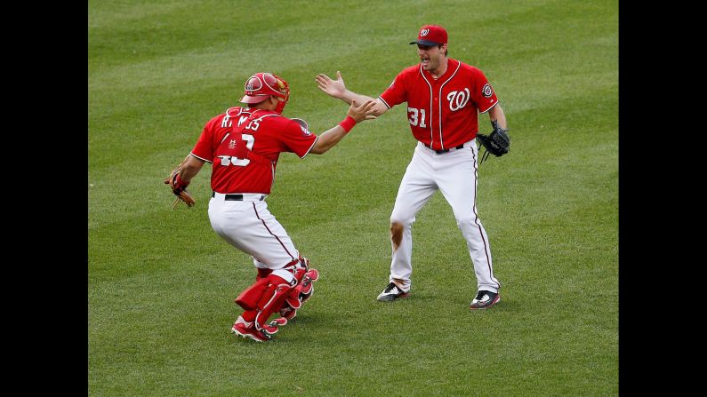 After throwing a no-hitter game on Saturday, June 20, Washington Nationals starting pitcher Max Scherzer celebrates with catcher Wilson Ramos. The Nationals defeated the Pittsburgh Pirates 6-0 at Nationals Park in Washington. 