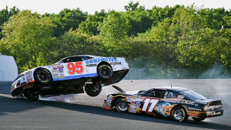 D.J. Kennington, driver of No. 17, crashes with Anthony Simone during the NASCAR Canadian Tire Series Leland Industries 300 at Sunset Speedway on Saturday, June 20, in Innisfil, Ontario. 