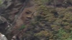 mysterious face etched in cliff dnt canada_00001521.jpg