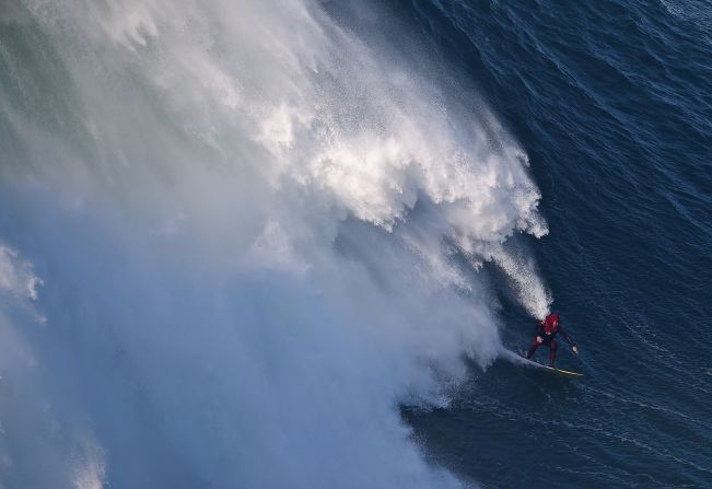 Andrew Cotton's passion and profession is tackling the world's biggest waves on his surfboard.