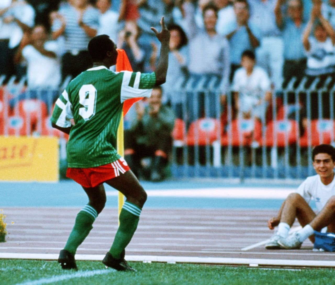 Roger Milla's famous corner flag celebration is seen after the first of his two goals against Colombia in the last 16 of the 1990 World Cup.