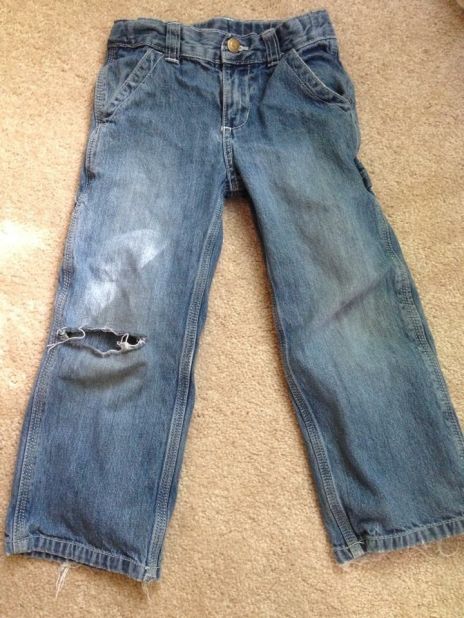 A poignant moment: When Donovan, 5, outgrew his brother's hand-me-down jeans. "The legs told two sides of the story. Rough-and-tumble Donovan, and quiet, contemplative Edison."