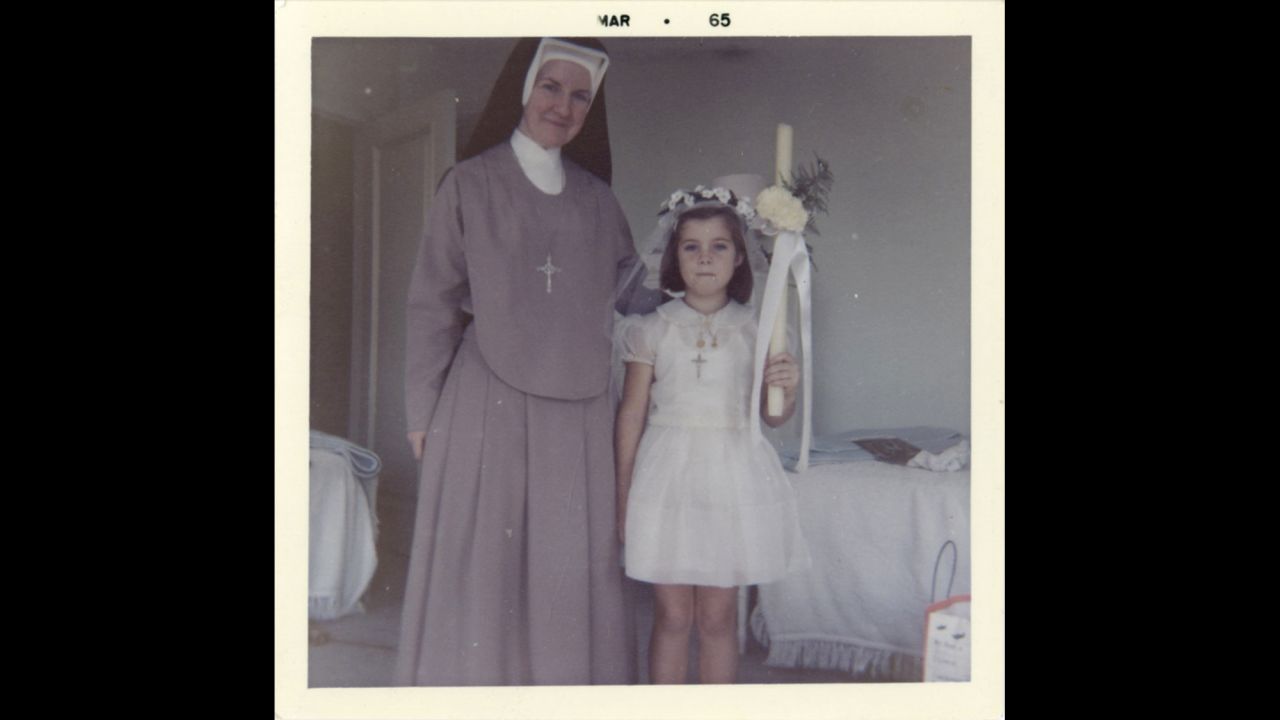 Caroline Kennedy with a nun in March 1965.