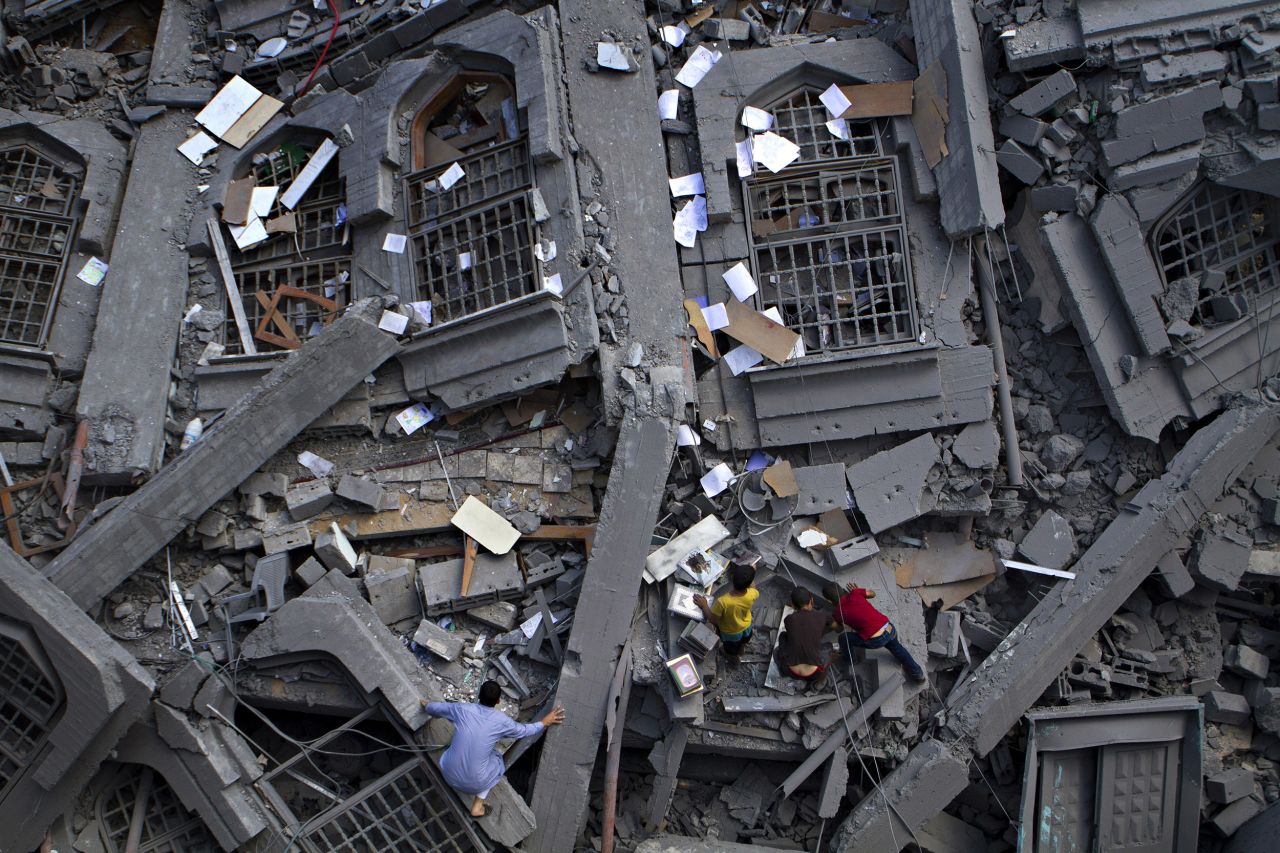 In this photo, "Palestinians collect religious books in the rubble of the Al-Qassam mosque," says the <a href="http://www.iwmf.org/heidi-levine/" target="_blank" target="_blank">International Women's Media Foundation</a>, which gave Levine the award.