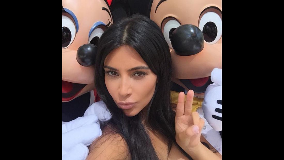 Television personality Kim Kardashian <a href="https://twitter.com/KimKardashian/status/611191267259609089" target="_blank" target="_blank">tweeted this photo</a> of her with Mickey and Minnie Mouse on Wednesday, June 17.