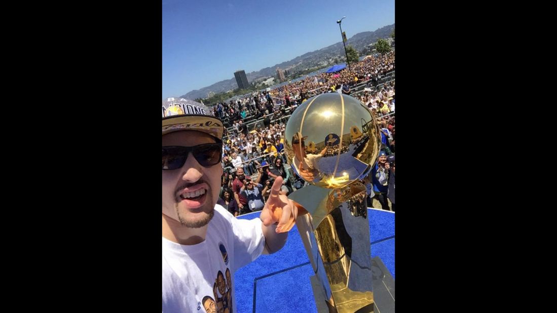 Basketball star Klay Thompson <a href="https://twitter.com/KlayThompson/status/611991938619707392" target="_blank" target="_blank">poses with the Larry O'Brien Trophy</a> on Friday, June 19. Thompson and the Golden State Warriors were celebrating with their fans a few days after winning the NBA Finals. 