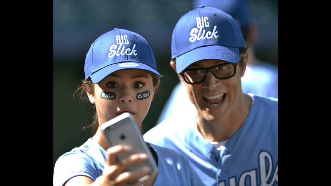 Singer Selena Gomez and actor Johnny Knoxville take a selfie before the Big Slick celebrity softball game on Friday, June 19.