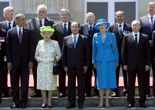 The Queen is joined by U.S. President Barack Obama, French President Francois Hollande, Queen Margrethe of Denmark and Russian President Vladimir Putin for a group photo of world leaders attending the D-Day 70th Anniversary ceremonies at Chateau de Benouville in Benouville, France, June 6, 2014. 