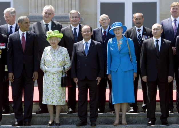The Queen is joined by U.S. President Barack Obama, French President Francois Hollande, Queen Margrethe of Denmark and Russian President Vladimir Putin for a group photo of world leaders attending the D-Day 70th Anniversary ceremonies at Chateau de Benouville in Benouville, France, June 6, 2014.