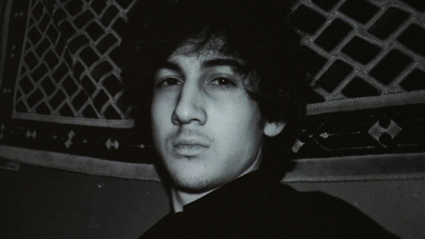A photo of Dzhokhar Tsarnaev appears on a computer screen from a page off VKontakte, a Russian social media site, in this April 19, 2013 file photo.