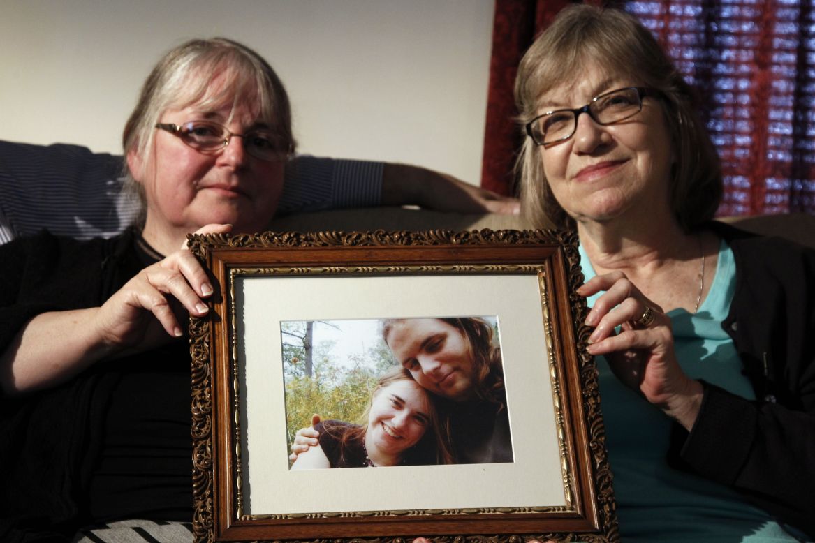 Mothers Linda Boyle, left, and Lyn Coleman hold photo of their married children, Joshua Boyle and Caitlin Coleman, who were kidnapped by the Taliban in late 2012. Coleman was pregnant when she was kidnapped and is believed to have had a child in captivity.
