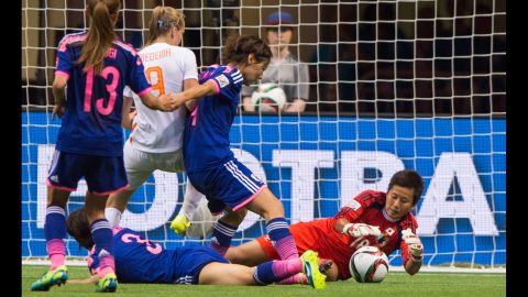 Japan goalkeeper Ayumi Kaihori dives for a save during a round-of-16 match in Vancouver on Tuesday, June 23. Japan defeated the Netherlands 2-1 to advance to the quarterfinals of the tournament.