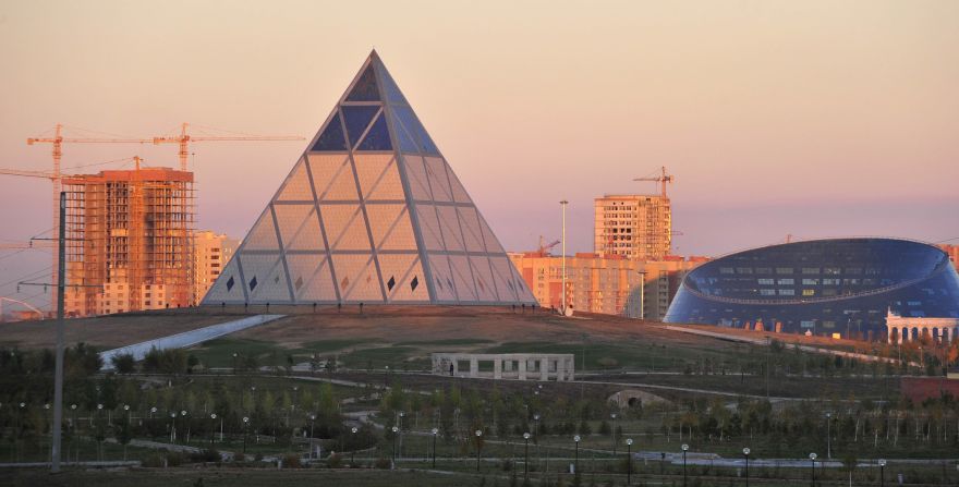 The pyramid might be an ancient design, but it's given a 21st century makeover in Astana's 62-meter-high Palace of Peace and Reconciliation (pictured center).<br />The glass pyramid was built in 2006, specifically to host the Congress of Leaders of World and Traditional Religions. 