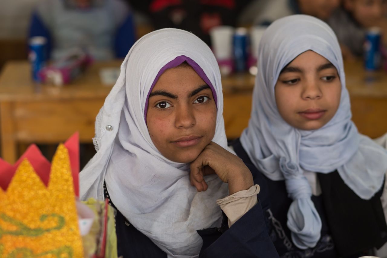 Most Egyptian girls are "cut," as it is often called, between the ages of nine and 12. Here, in a photo provided to CNN by the UNFPA, children of a similar age attend class at a school in Assiut on February 1.