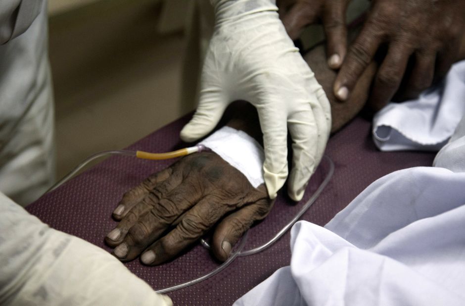 A patient suffering from heatstroke receives treatment at a Karachi  hospital on Wednesday, June 24.