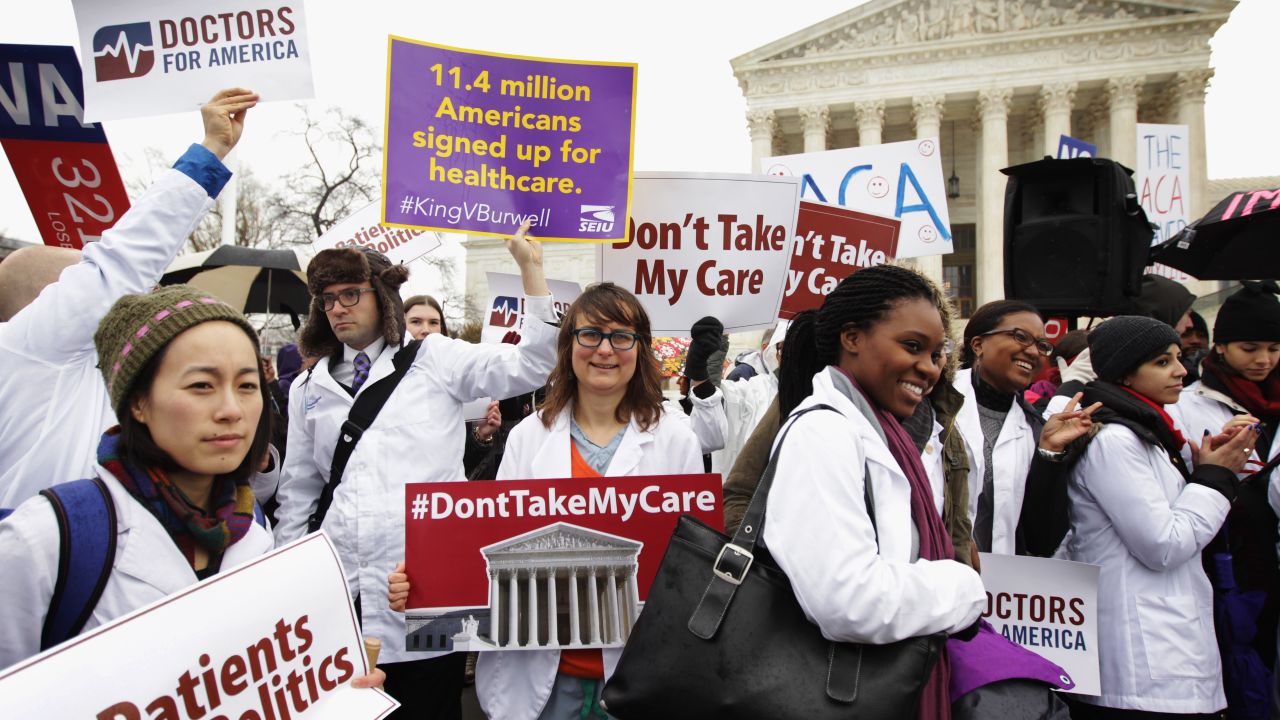 Supporters of the Affordable Care Act gather in front of the Supreme Court during a rally March 4, 2015 in Washington, D.C.