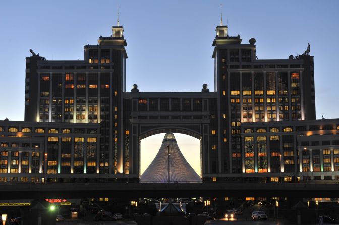 A view of the Khan Shatyr entertainment center (background) through the arch of another of Astana's grandiose buildings.