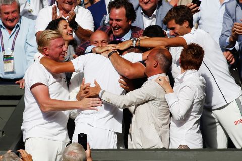 Novak Djokovic (middle) celebrates his Wimbledon 2014 championship surrounded by his  friends, family and staff. Top players will often splurge on added housing for their friends and family on the road. Meanwhile, not all players in the top 100 can afford to travel with a coach full-time. 