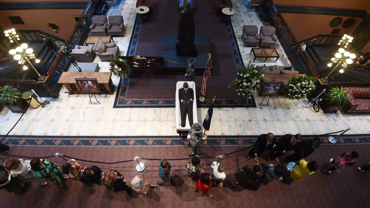 Mourners in Columbia, South Carolina, pay their respects to state Sen. Clementa Pinckney as his body lies in the South Carolina State House on Wednesday, June 24. Pinckney, 41, was one of the nine people <a href="http://www.cnn.com/2015/06/18/us/gallery/charleston-south-carolina-church-shooting/index.html" target="_blank">killed in a church shooting</a> June 17 in Charleston, South Carolina.