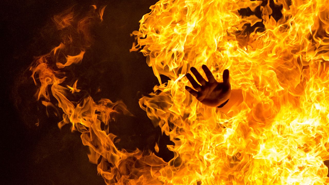 A reveler in Alcobendas, Spain, jumps over a bonfire during the Night of San Juan on Wednesday, June 24. The annual festival welcomes the summer season in Spain and takes place on the shortest night of the year.