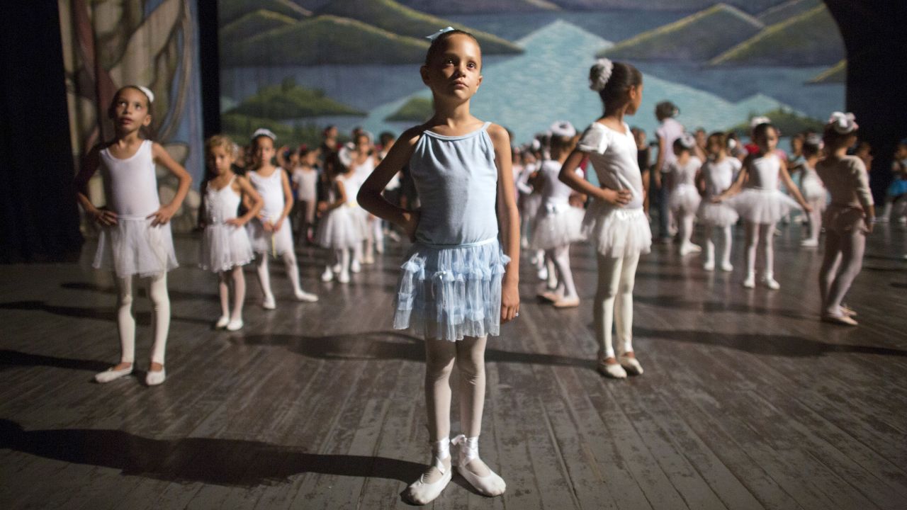Mariana Garcia, 6, listens to instructions Friday, June 9, during a rehearsal of Tchaikovsky's "Swan Lake" ballet in Camaguey, Cuba.