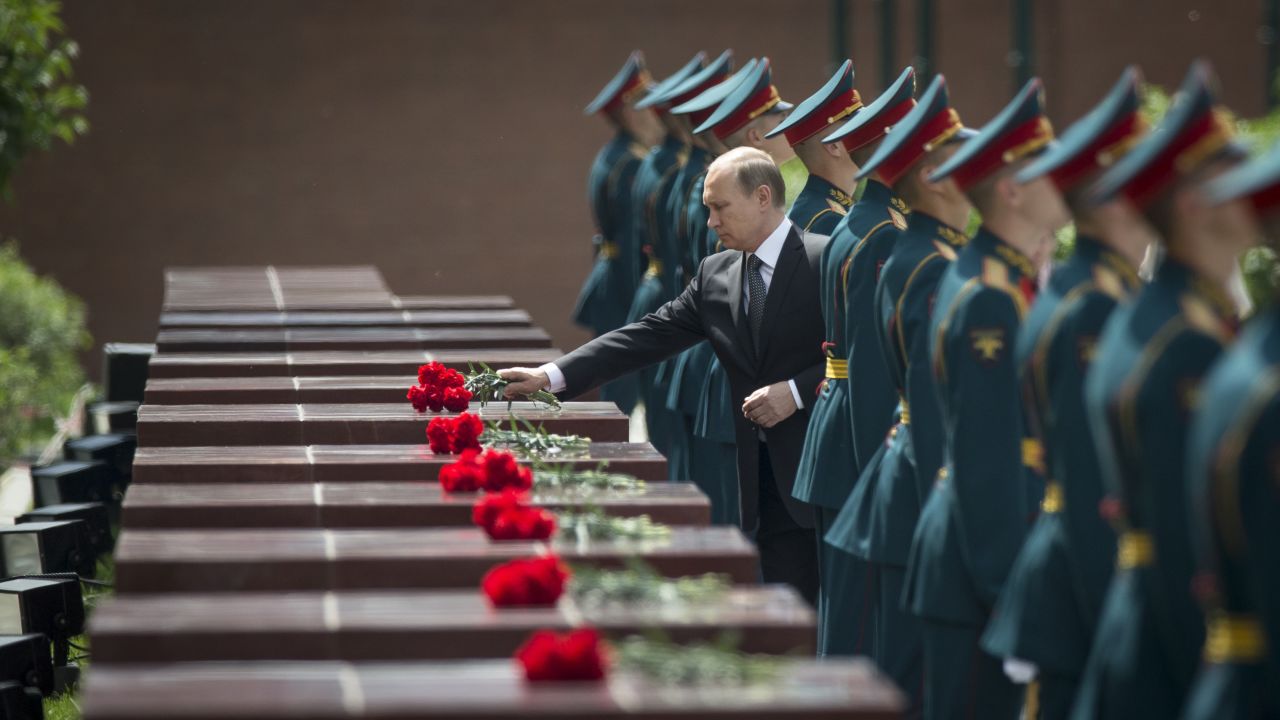 Russian President Vladimir Putin takes part in a wreath-laying ceremony at Moscow's Tomb of the Unknown Soldier on Monday, June 22. The ceremony marked the 74th anniversary of the Nazi invasion of the Soviet Union.