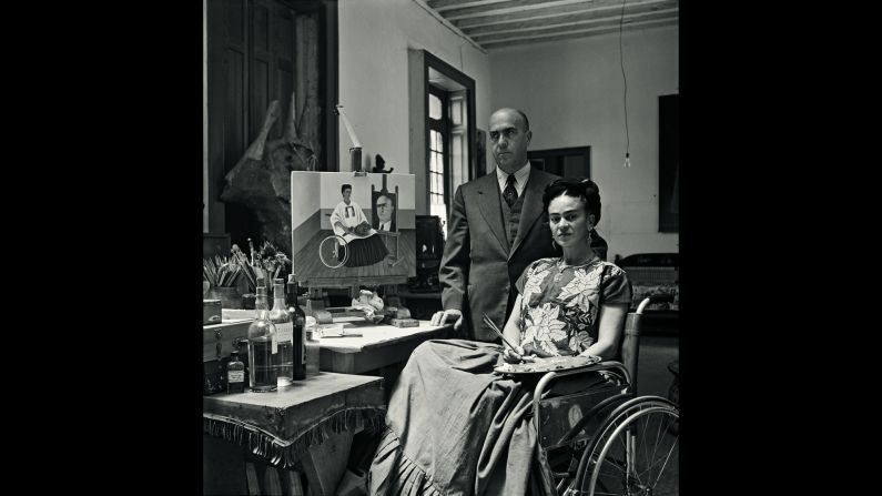 Kahlo and Dr. Juan Farill are photographed in her home in 1951. In 1950, Kahlo underwent several surgeries for reoccurring spinal issues, and she had to use a wheelchair.