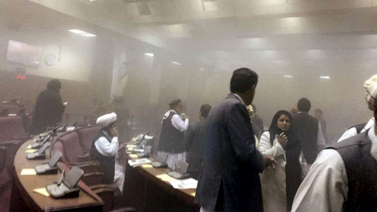 Members of Afghanistan's Parliament are led to safety after <a href="http://www.cnn.com/2015/06/22/asia/afghanistan-kabul-parliament-attack/index.html" target="_blank">an attack on the parliament building</a> Monday, June 22, in Kabul. Afghan security forces managed to fend off six Taliban attackers, all of whom were killed in a firefight, police spokesman Ebadullah Karimi said. 
