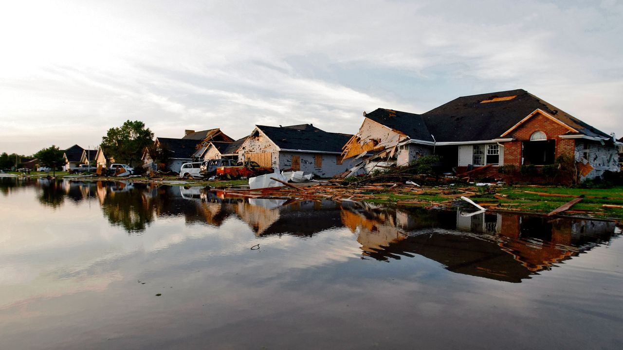 Damaged homes are seen on a flooded street in Coal City, Illinois, one day after a tornado hit on Monday, June 22. 