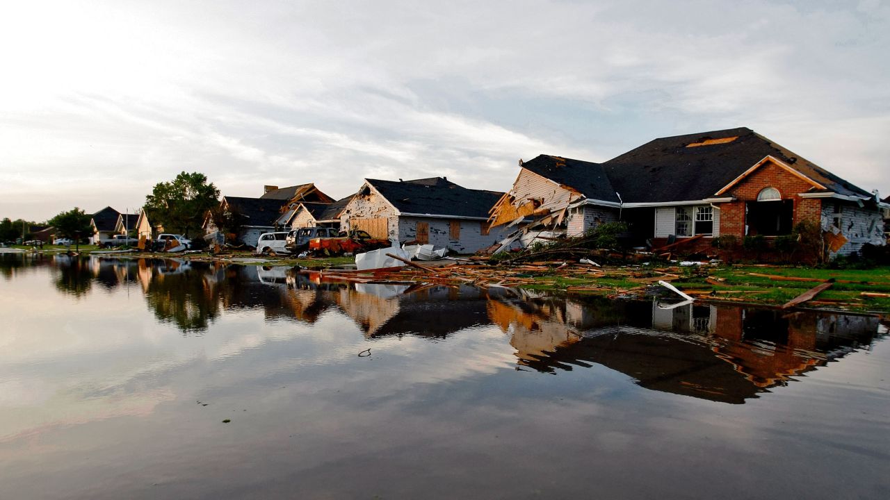 Damaged homes are seen on a flooded street in Coal City, Illinois, one day after a tornado hit on Monday, June 22.