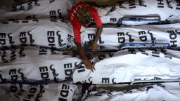 Covered corpses from the devastating heatwave are in seen in a mortuary in Karachi, Pakistan on June 26. The death toll from the heat wave in Sindh province topped 1,000, officials told CNN.
