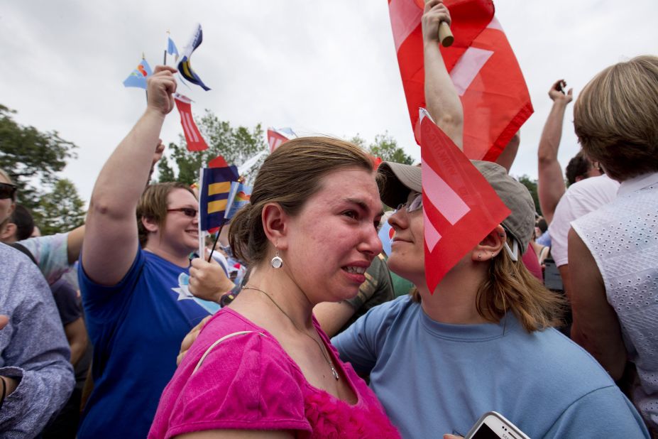 Ariel Olah, left, and her fiancee, Katie Boatman, are overcome by emotion outside the U.S. Supreme Court in Washington on Friday, June 26. 