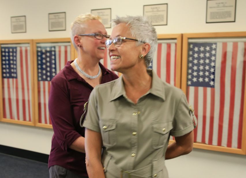 Kathy Petterson, left, and Beverly Reicks leave the Douglas County Clerk's office on June 26 after becoming the first same-sex couple to wed in Omaha, Nebraska.