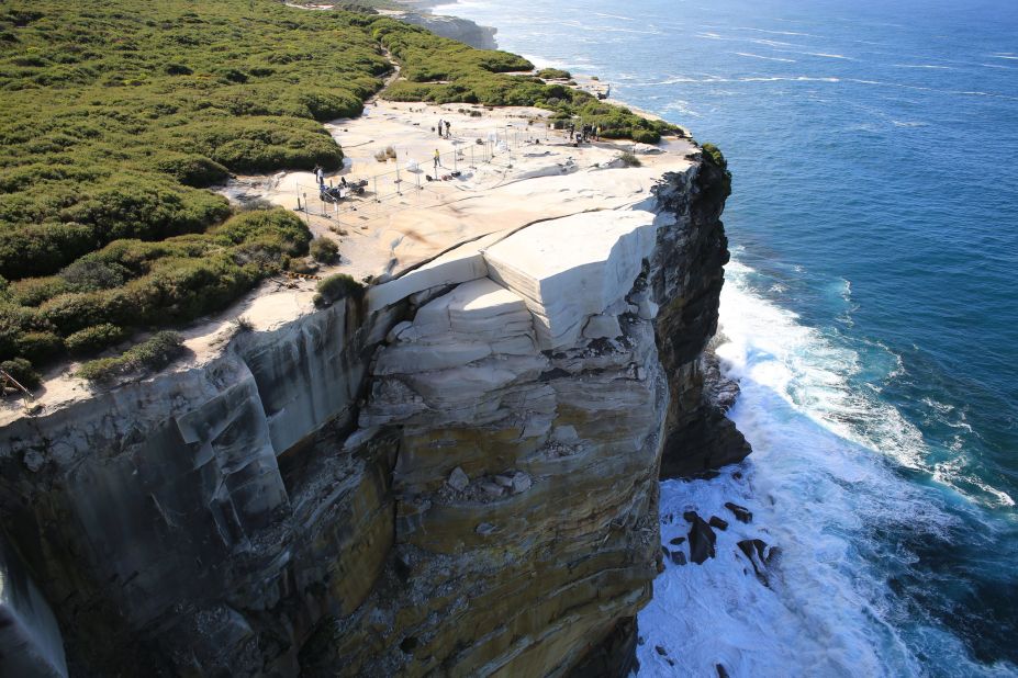 Government officials have warned visitors to stay away from the fragile Wedding Cake Rock structure at Royal National Park in Sydney. A safety fence has been erected to keep visitors away.
