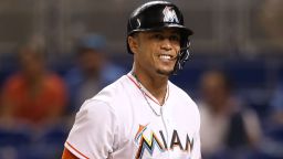 Giancarlo Stanton of the Miami Marlins winces after striking out during the ninth inning of the game against the Los Angeles Dodgers at Marlins Park on June 26, 2015 in Miami, Florida.