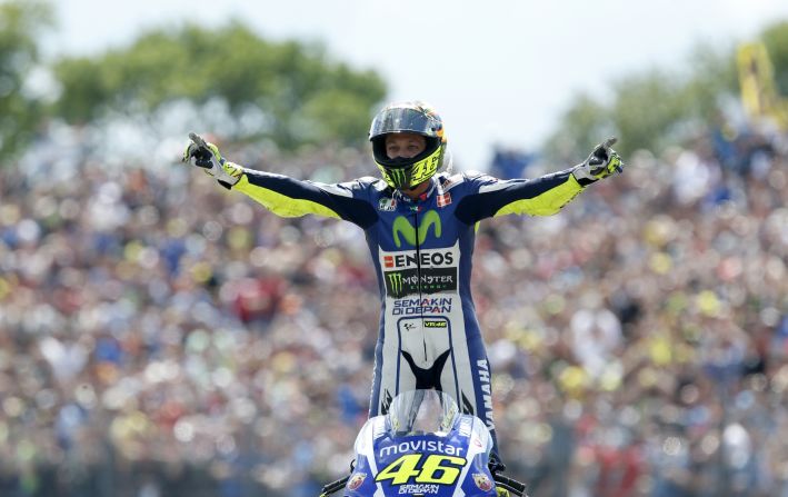 Valentino Rossi celebrates after winning the Dutch Grand Prix at Assen, his third victory this season. 