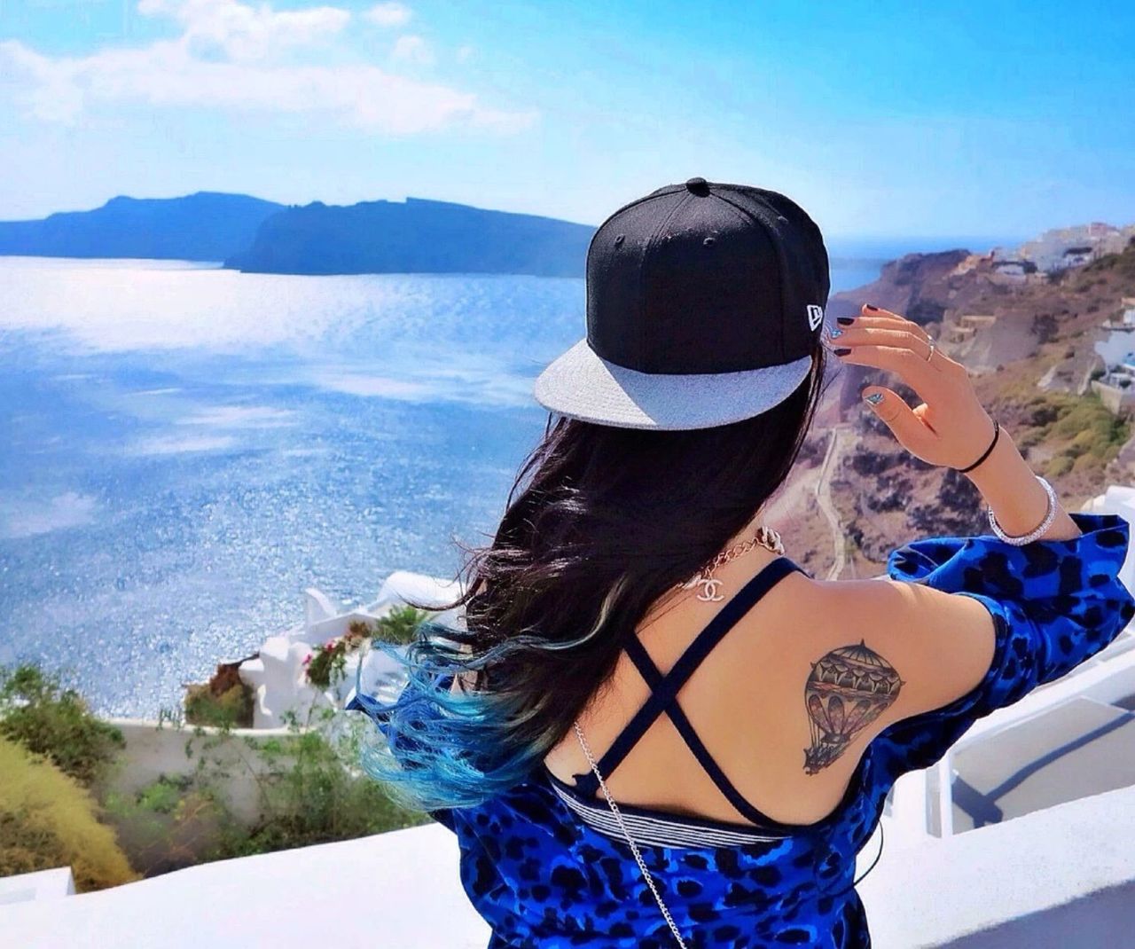 Wang Zi, 28, fashion designer, chose a hot air balloon tattoo.
