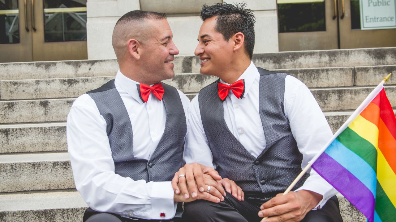 Carlos Santos-Herrera and David Herrera-Santos celebrate their union. "When we heard the news this morning, I jumped up, and I started screaming," Santos-Herrera said. "I called (my fiancé) up and said: 'We need to get married now. Forget about Florida.' "