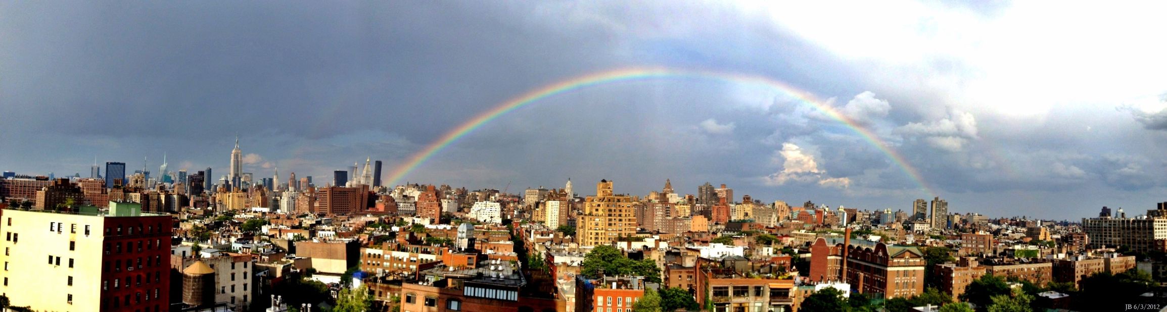 A full rainbow stretches over the city. This rare occurrence was captured by iReporter <a href="http://ireport.cnn.com/docs/DOC-800994">Jeffrey Berman</a>. 