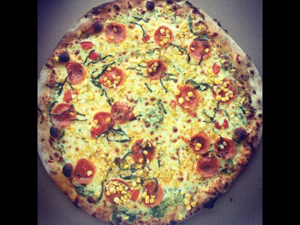 The Sunshine pizza is one of Suncrest Gardens' most popular. It features roasted sweet corn on a pesto base. Suncrest is located in Cochrane, Wisconsin.