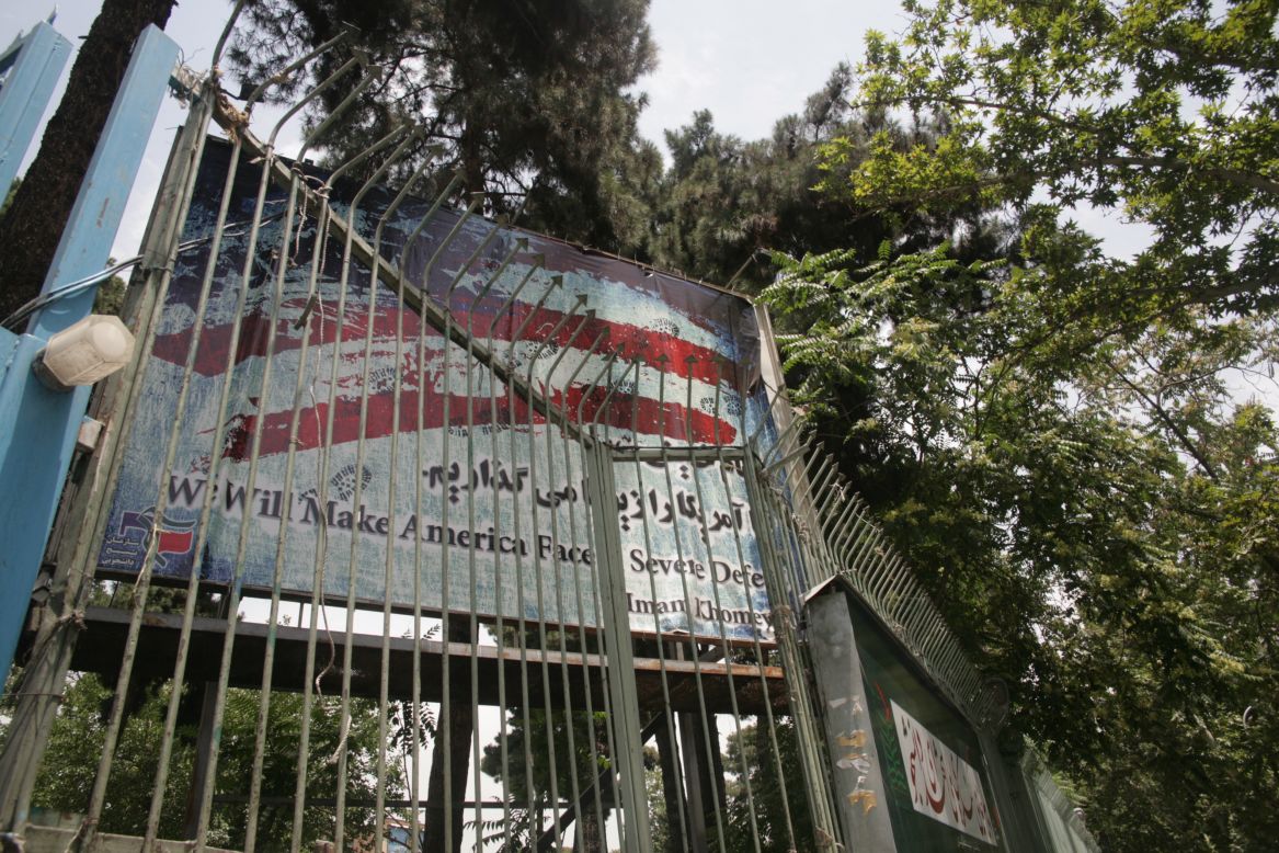  "We will make America face severe defeat," Iran's late Supreme Leader Ayatollah Ruhollah Khomeini vowed -- a quote displayed on the entrance gate.